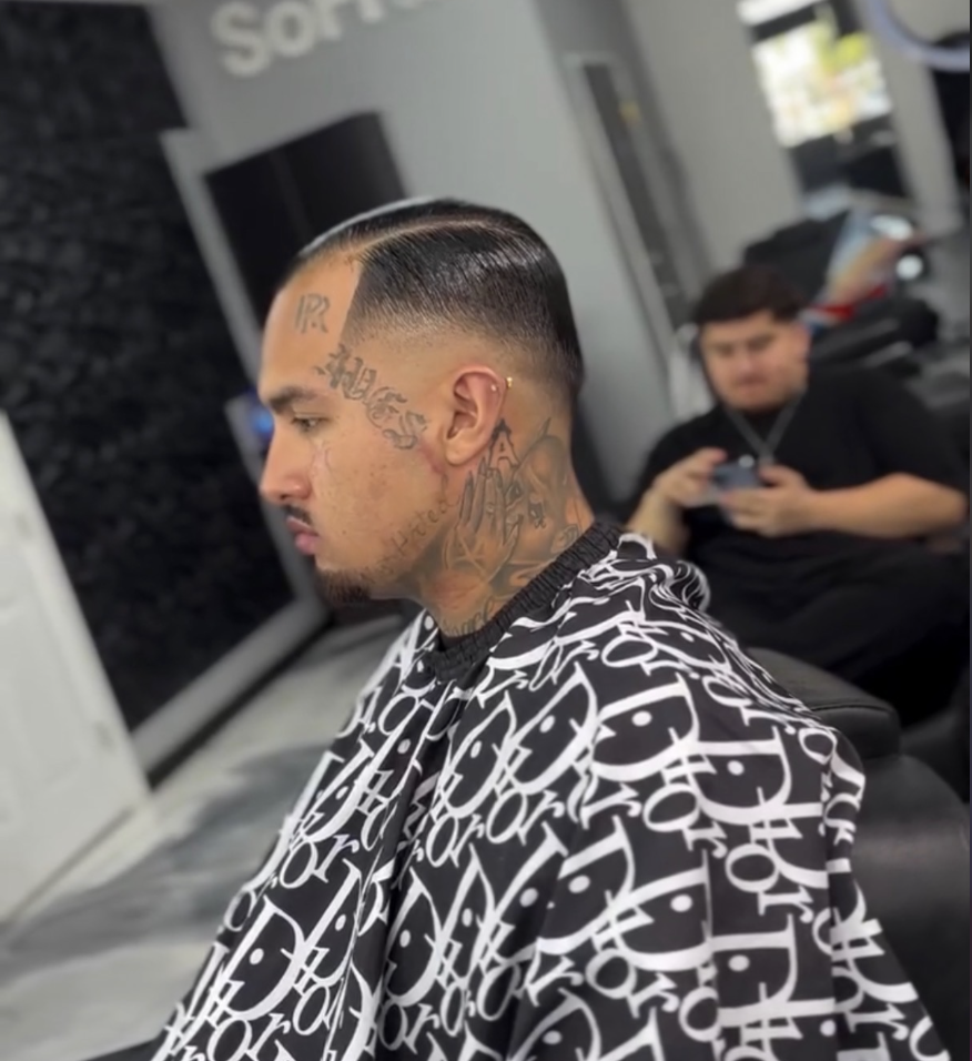 Slick back with skin fade side profile