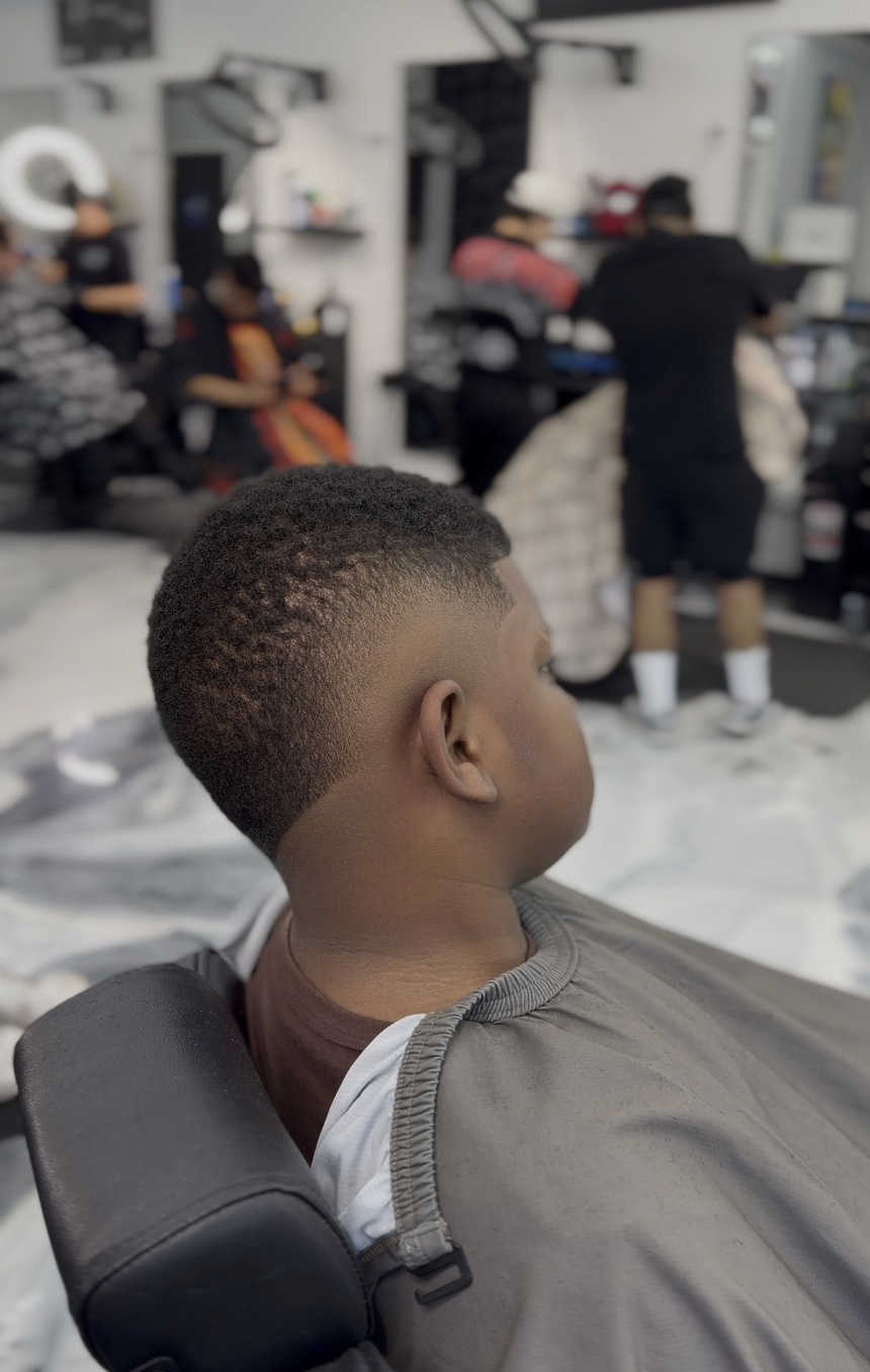 Kids low fade haircut in the shop